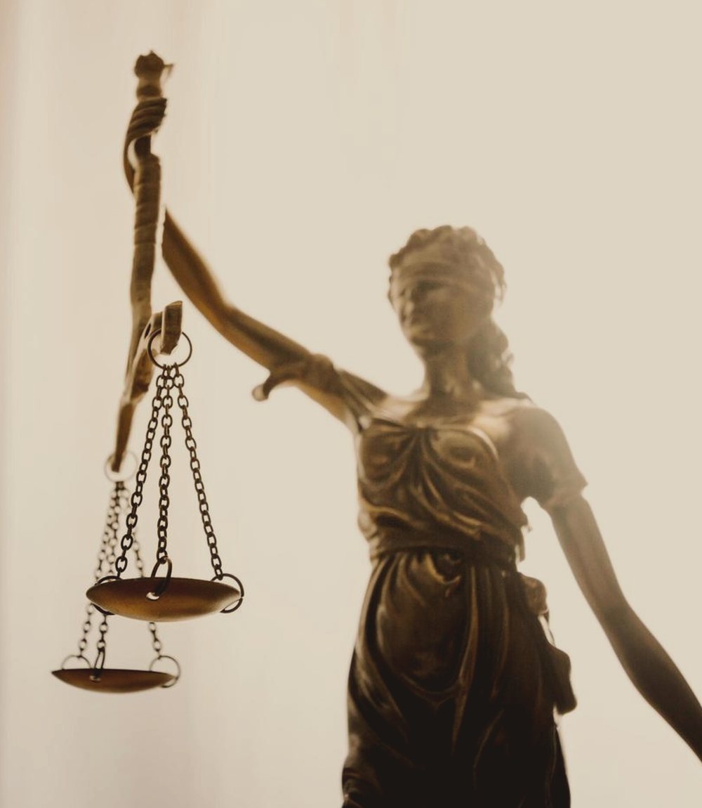 Scales of justice on an attorney's desk